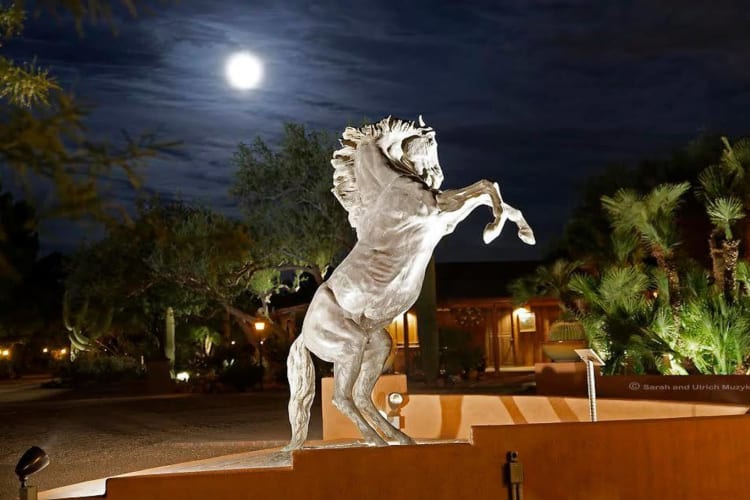 Statue in ranch entranceway